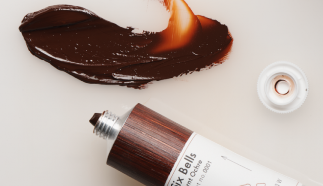 A tube of Six Bells Burnt Ochre paint