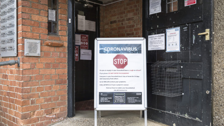 Buckingham, UK - March 30, 2020. Coronavirus COVID-19 warning sign with prevention information outside a GP doctor surgery. Credit: Paul Maguire