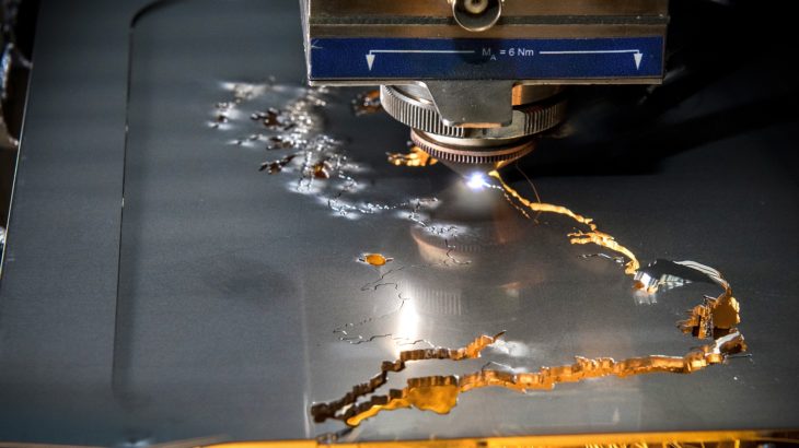 A fibre laser cutting metal at the Zepler Institute. Fibre lasers use considerably less energy than traditional methods and are a key means of decarbonising manufacturing.